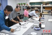 摇卦免费两岸艺术家在安徽“共绘一幅画”